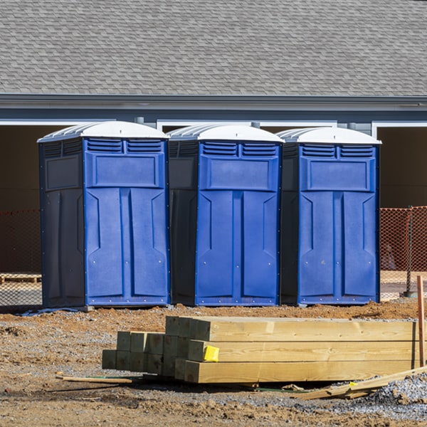 what is the cost difference between standard and deluxe porta potty rentals in Forest Hills